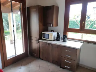 Cucina o angolo cottura di COTTAGE SU MERTI country