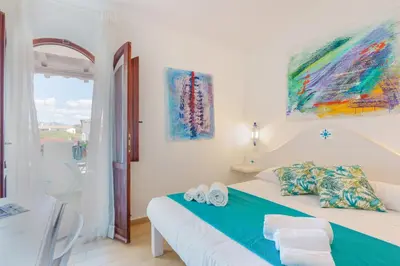 Letto o letti in una camera di B&B Villamarina42