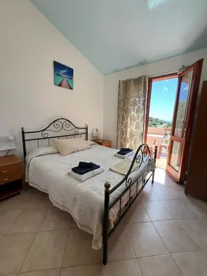 Letto o letti in una camera di Villa Leonardo