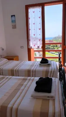 Letto o letti in una camera di Villa Leonardo
