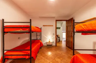 Letto o letti in una camera di Casa Pedra Longa