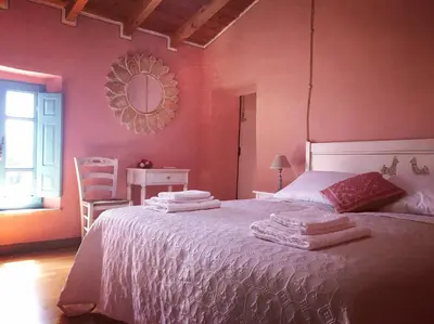 Letto o letti in una camera di B&B Su Strintu