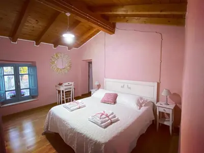 Letto o letti in una camera di B&B Su Strintu