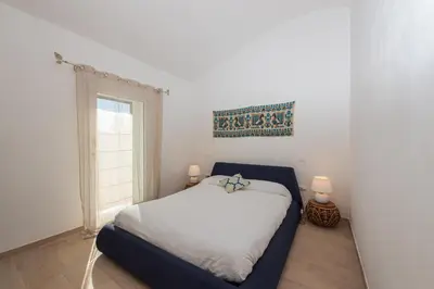 Letto o letti in una camera di B&B BITHIA