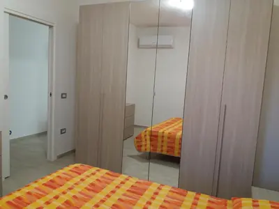 Letto o letti in una camera di Casa Vacanze La Pintadera