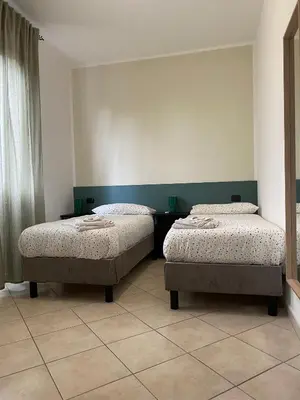 Letto o letti in una camera di B&B Ramses