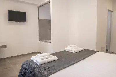 Letto o letti in una camera di Suites Garibaldi