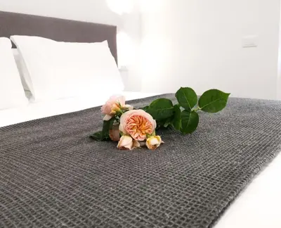 Letto o letti in una camera di Suites Garibaldi