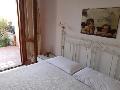 Letto o letti in una camera di Sunny garden house