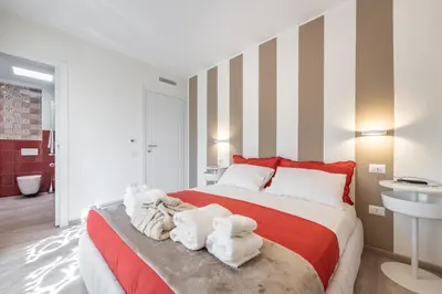 Letto o letti in una camera di Le residenze di Carlà - Stampace