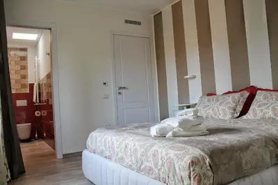 Letto o letti in una camera di Le residenze di Carlà - Stampace