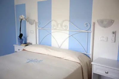 Letto o letti in una camera di Hotel Stella D'Oro