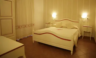 Letto o letti in una camera di Hotel Stella D'Oro