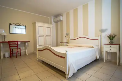 Letto o letti in una camera di Hotel Stella D'Oro