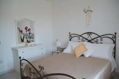 Letto o letti in una camera di Casa delle Conchiglie