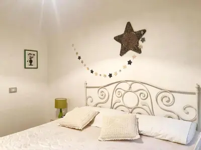 Letto o letti in una camera di Casa Ferreri