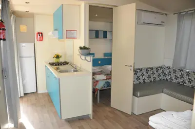 Letto o letti in una camera di Villaggio Camping Torre Salinas