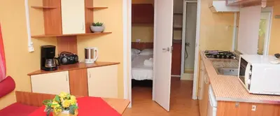 Cucina o angolo cottura di Villaggio Camping Torre Salinas