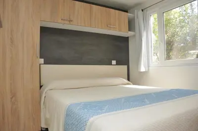 Letto o letti in una camera di Villaggio Camping Torre Salinas