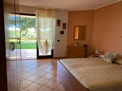 Letto o letti in una camera di Villa Belvedere