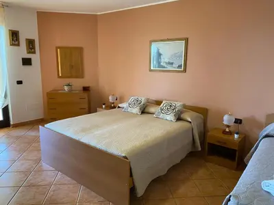 Letto o letti in una camera di Villa Belvedere