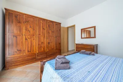 Letto o letti in una camera di Nonna Defenza
