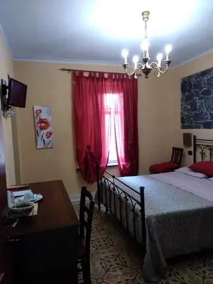 Letto o letti in una camera di La Corte di Lucina