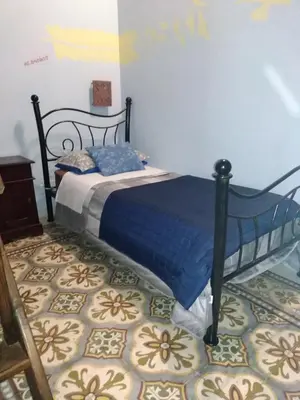 Letto o letti in una camera di La Corte di Lucina