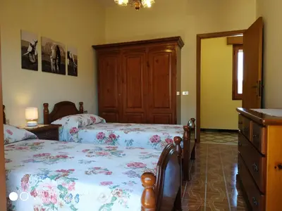 Letto o letti in una camera di Tertenia Centro