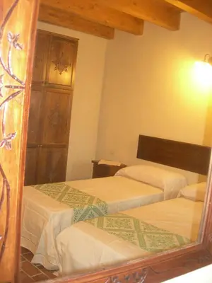Letto o letti in una camera di Agriturismo Battaglia