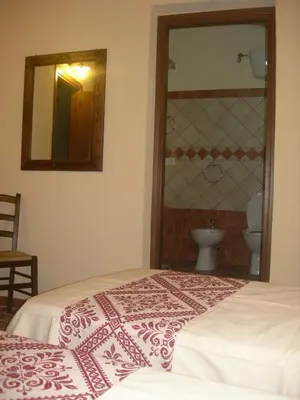 Letto o letti in una camera di Agriturismo Battaglia