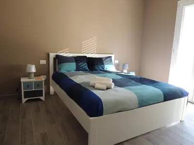 Letto o letti in una camera di Il Colle del Barone