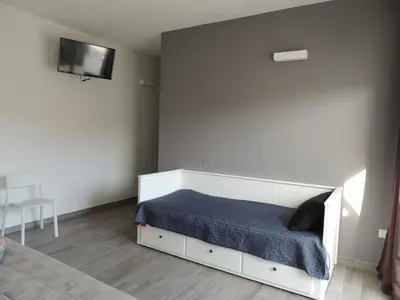 Letto o letti in una camera di Il Colle del Barone