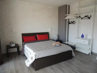 Letto o letti in una camera di Il Colle del Barone