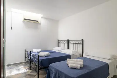 Letto o letti in una camera di Alisei Family House