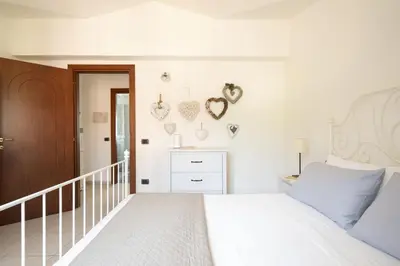 Letto o letti in una camera di Bilocale n 10 Arbatax vicino al mare