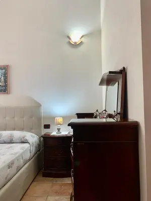 Letto o letti in una camera di casa vacanza V&G