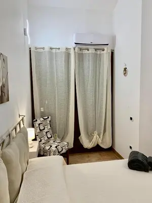 Letto o letti in una camera di casa vacanza V&G