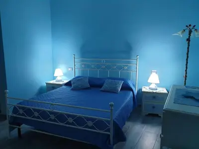 Letto o letti in una camera di Casa vacanze El Flamingo Rosa