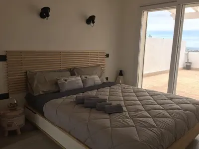 Letto o letti in una camera di Attico vista mare