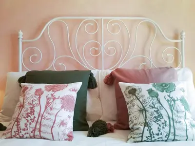Letto o letti in una camera di Villa Bellavista con piscina privata, vista mare vicino a Villasimius