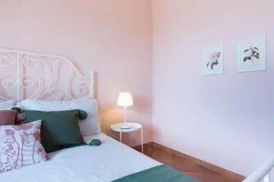 Letto o letti in una camera di Villa Bellavista con piscina privata, vista mare vicino a Villasimius