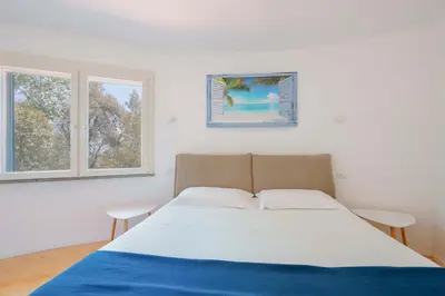 Letto o letti in una camera di B&B Villa Zola