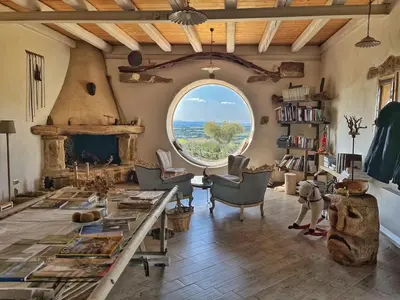 Area soggiorno di Is Perdas Rural Retreat & Spa