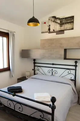 Letto o letti in una camera di Is Seddas B&B