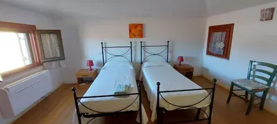 Letto o letti in una camera di Casa Sant'Anna