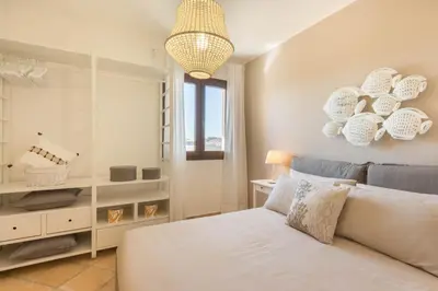 Letto o letti in una camera di Villa Amelia