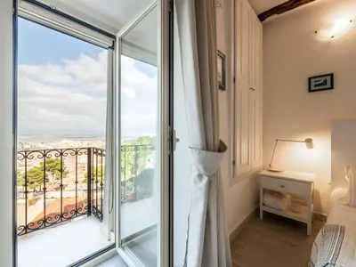 Letto o letti in una camera di Karalis Relais