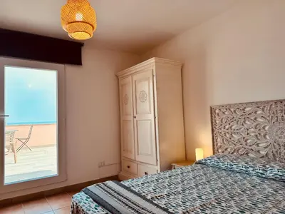 Letto o letti in una camera di Attico La Terrazza sul Mare