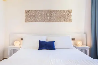 Letto o letti in una camera di Residenza le Scalette